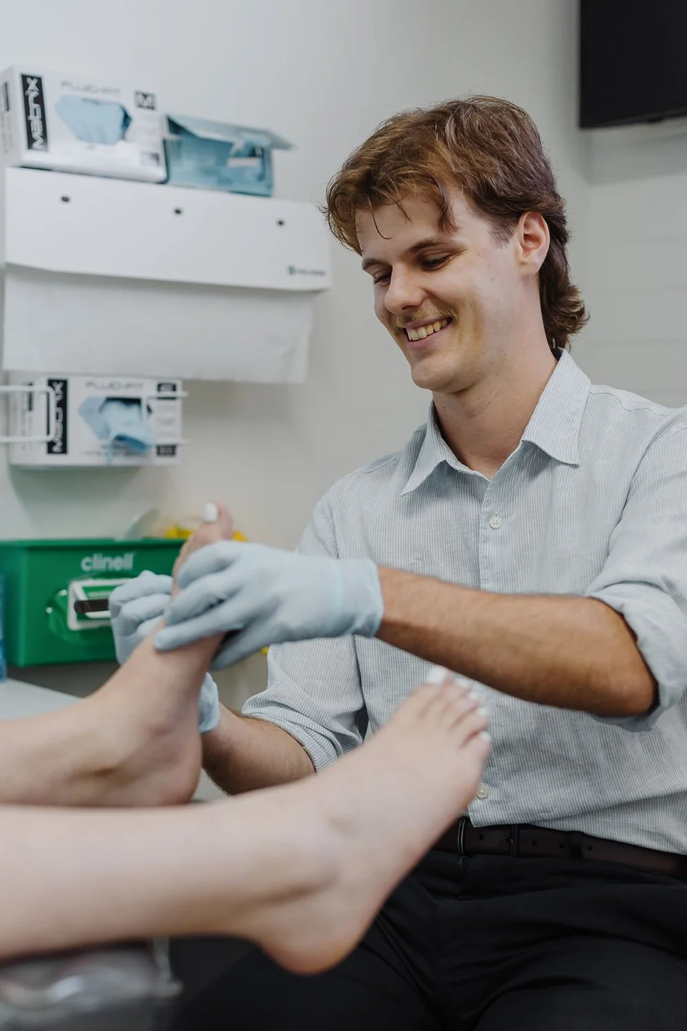 JS Podiatry podiatrist performing a medical pedicure